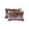 Set of Two 12" X 20" Black And Orange Leopard Throw Pillows