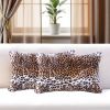 Set of Two 12" X 20" Black And Orange Leopard Throw Pillows